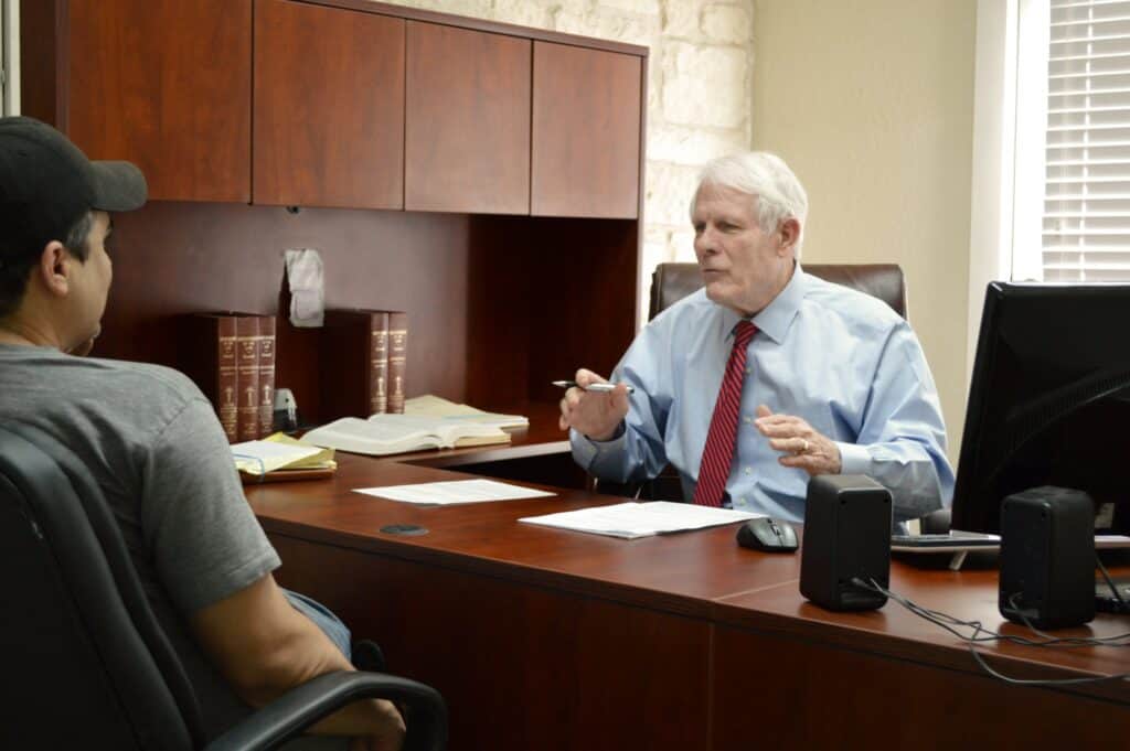 Dan Wimmer meeting with a client at his office